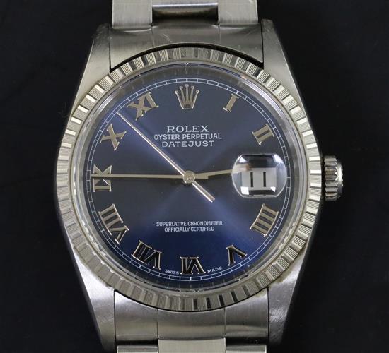 A gentlemens Rolex stainless steel Oyster Perpetual Datejust Superlative Chronometer with blue Roman dial, original box and papers,